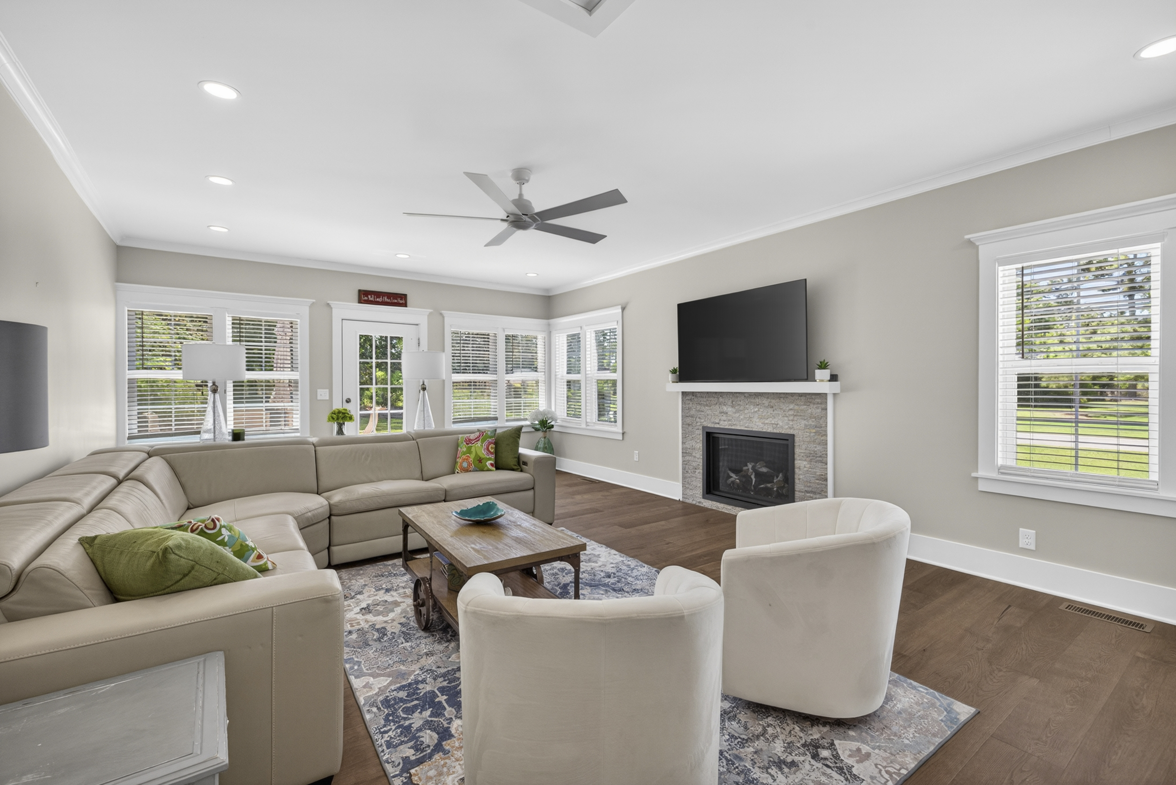 Living room with fireplace and sectional sofa